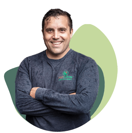 Daniel, Managing Director of Hort Culture, arms crossed and smiling, in a Hort Culture jumper.
